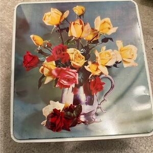 2 vintage tins, vintage sewing patterns, and misc sewing supplies